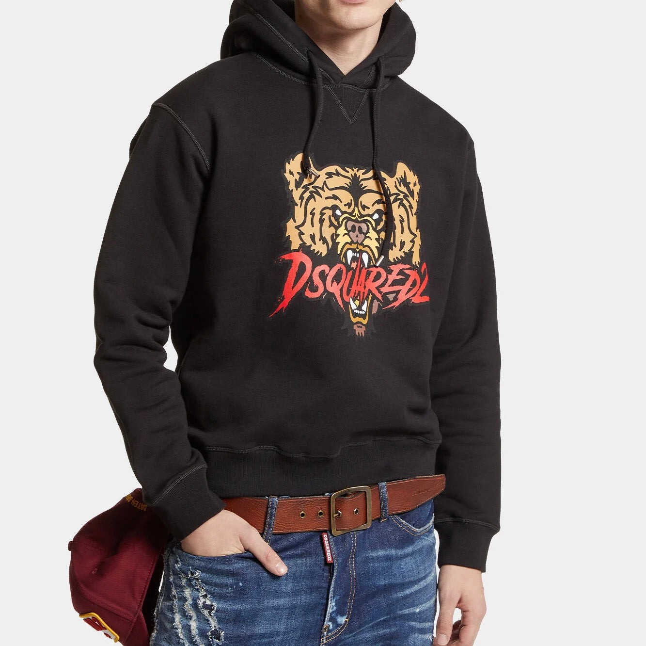 A bear and brand lettering are printed on this cotton fleece hoodie. The comfortable fit suggests laid-back outfits like sweatpants and sneakers.