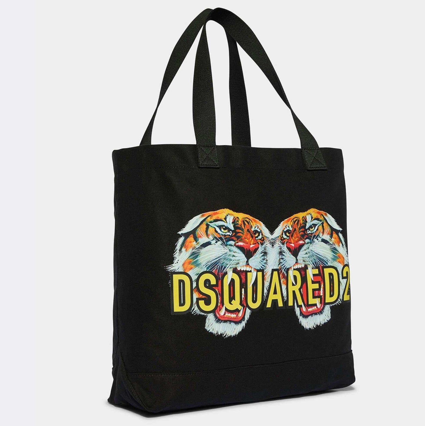 Go get 'em, tiger! Make a bold statement with this canvas shopping bag in solid colour with print. Unlined, with double handle and internal zip pocket.