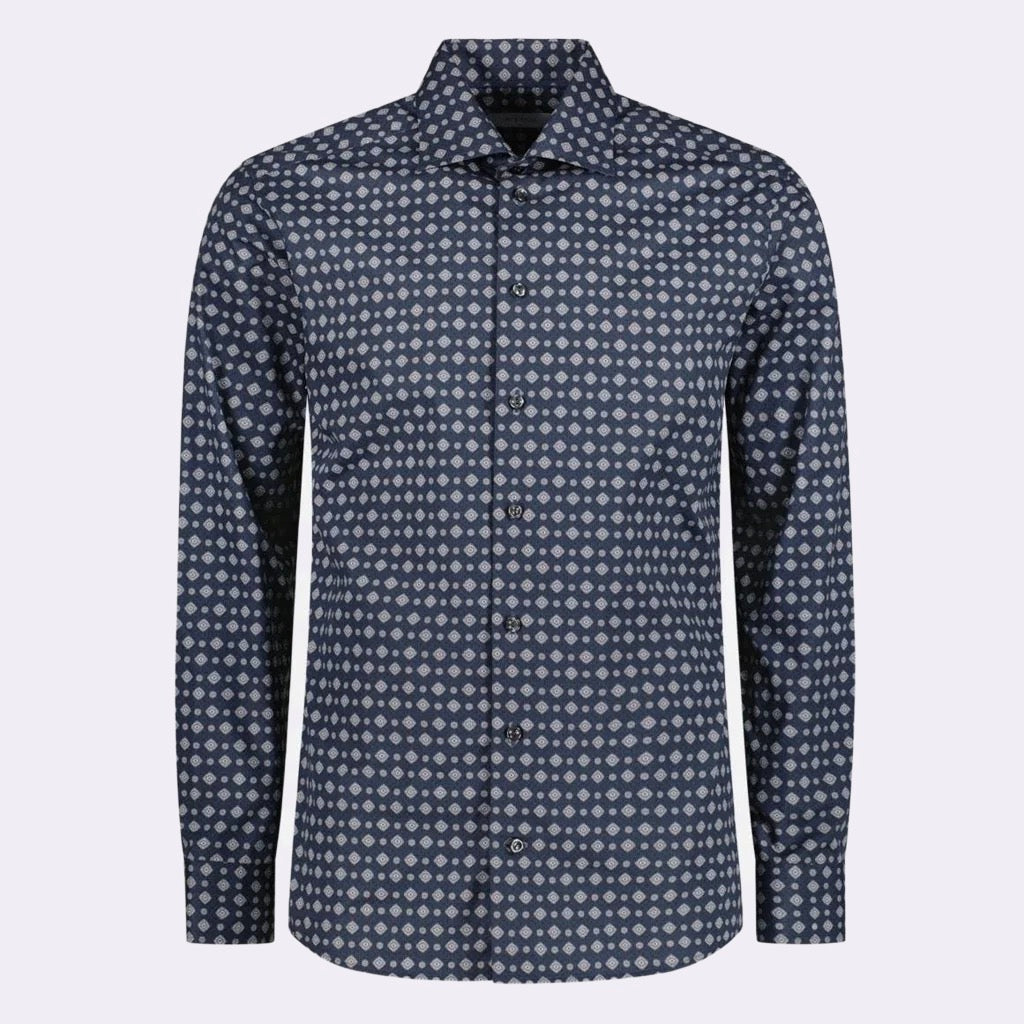 Bring some excitement to your closet with this dark blue dress shirt. This polished navy dress shirt is brought to life by an artistic and geometric medallion print. It’s a break from your normal solid-colored styles that still delivers a refined and classic look for days at the office and special occasions.