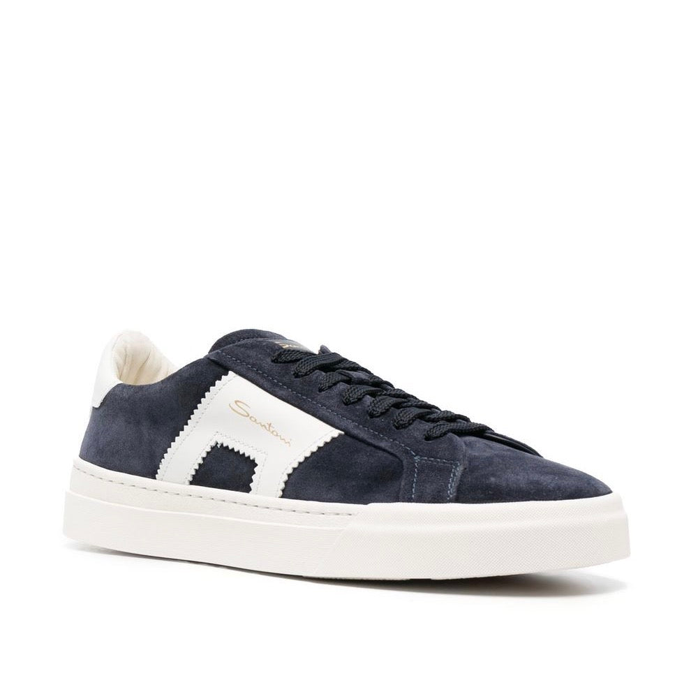 Santoni combines a contemporary aesthetic with its legacy in these Double Buckle sneakers. The upper is embellished with a contrasting leather accent inspired by one of the brand's signature codes, the double buckle.