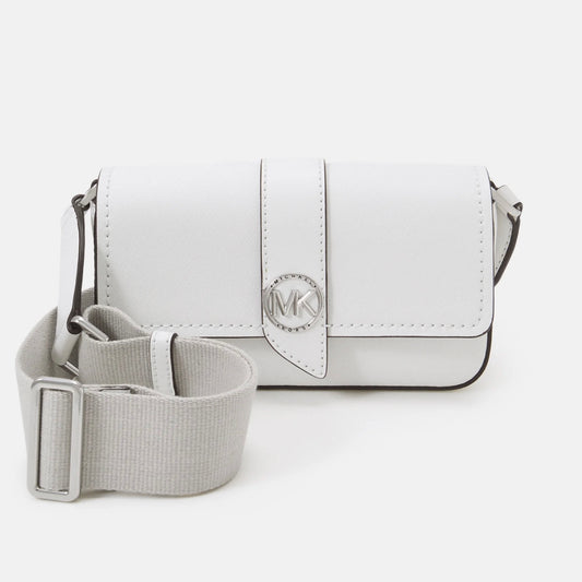 Meet the sought-after Greenwich sling crossbody, newly redesigned in a compact silhouette for ease of wear, 24/7. Made from Saffiano leather, this bag opens to a petite interior fitted with card slots for easy organization. Adjust the woven strap to find your desired fit.