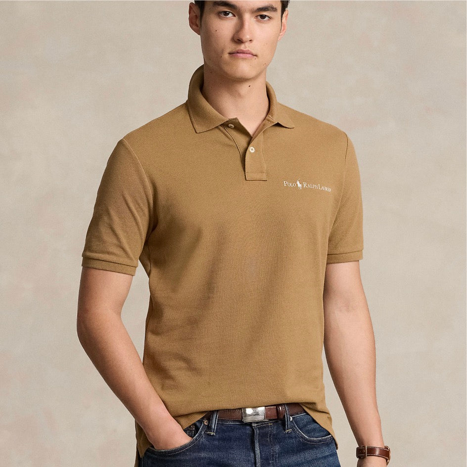 An American style standard since 1972, the Polo shirt has been imitated but never matched. Over the decades, Ralph Lauren has reimagined his signature style in a wide array of colors and fits, yet all retain the quality and attention to detail of the iconic original. This version is made with our highly breathable cotton mesh, which offers a textured look and a soft feel.
