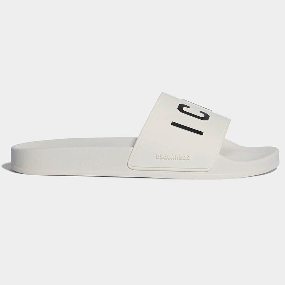 Step into luxury with these DSQUARED2 Icon Slides. The front features bold "ICON" lettering, while the sides boast 3D "DSQUARED2" lettering for a fashionable touch. The upper is made of 100% polyurethane, while the sole is crafted from 100% EVA for added comfort. Made in Italy, these slides are the epitome of style and quality.