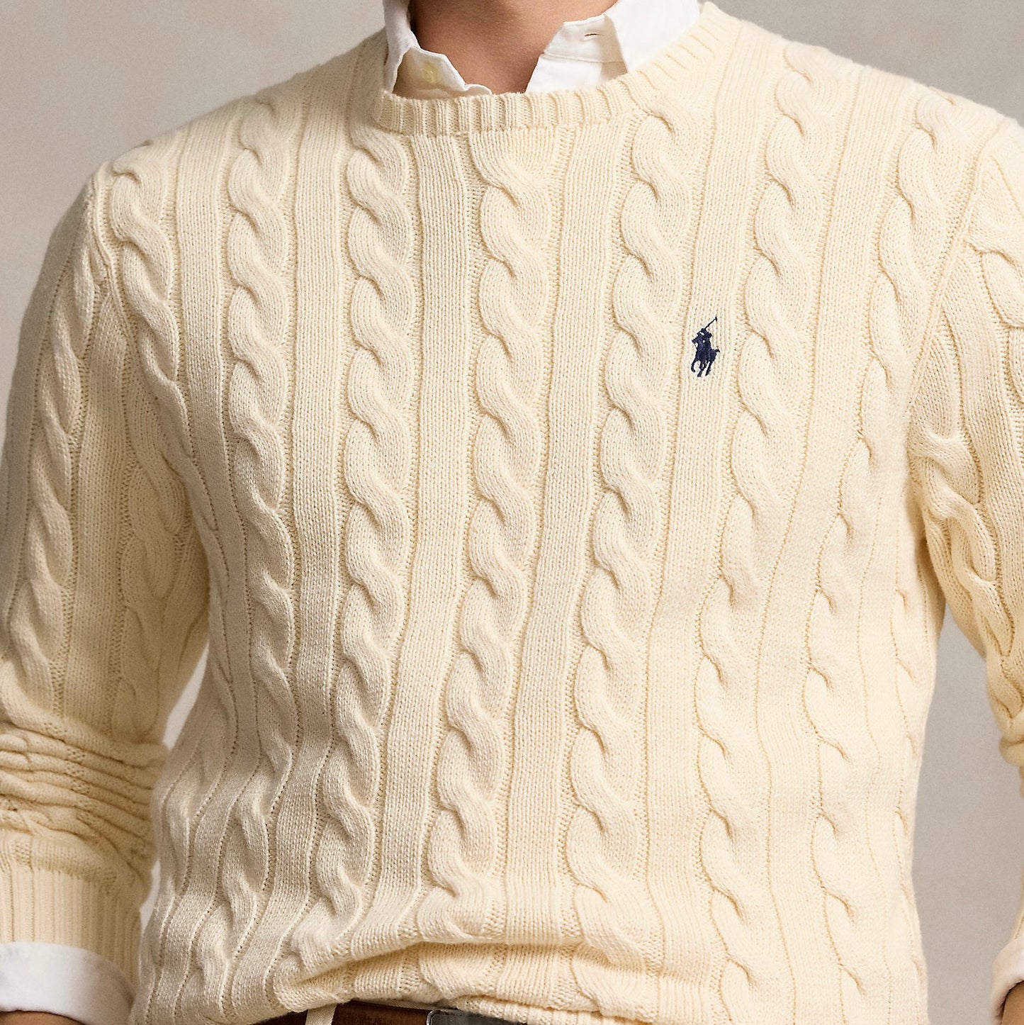 This cotton sweater combines two of Polo’s most iconic design elements: a textural cable-knit motif and our signature Pony.