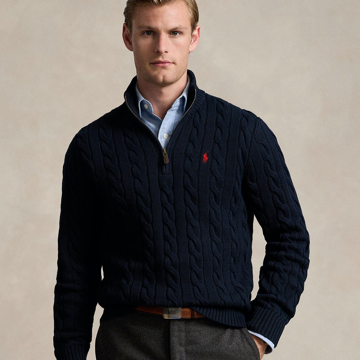 This chunky-knit cotton layer features our iconic cable design and signature embroidered Pony.