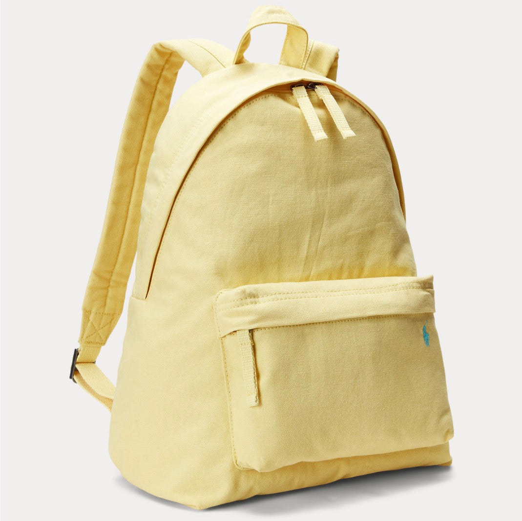 Offered in an array of vibrant colors, this canvas backpack is accented at the front pocket with Ralph Lauren’s signature embroidered Pony. A padded interior pocket helps protects your laptop or tablet.