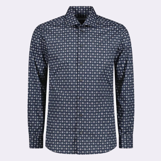 Bring some excitement to your closet with this dark blue dress shirt. This polished navy dress shirt is brought to life by an artistic and geometric medallion print. It’s a break from your normal solid-colored styles that still delivers a refined and classic look for days at the office and special occasions.