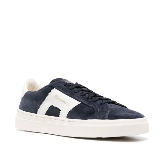 Santoni combines a contemporary aesthetic with its legacy in these Double Buckle sneakers. The upper is embellished with a contrasting leather accent inspired by one of the brand's signature codes, the double buckle.