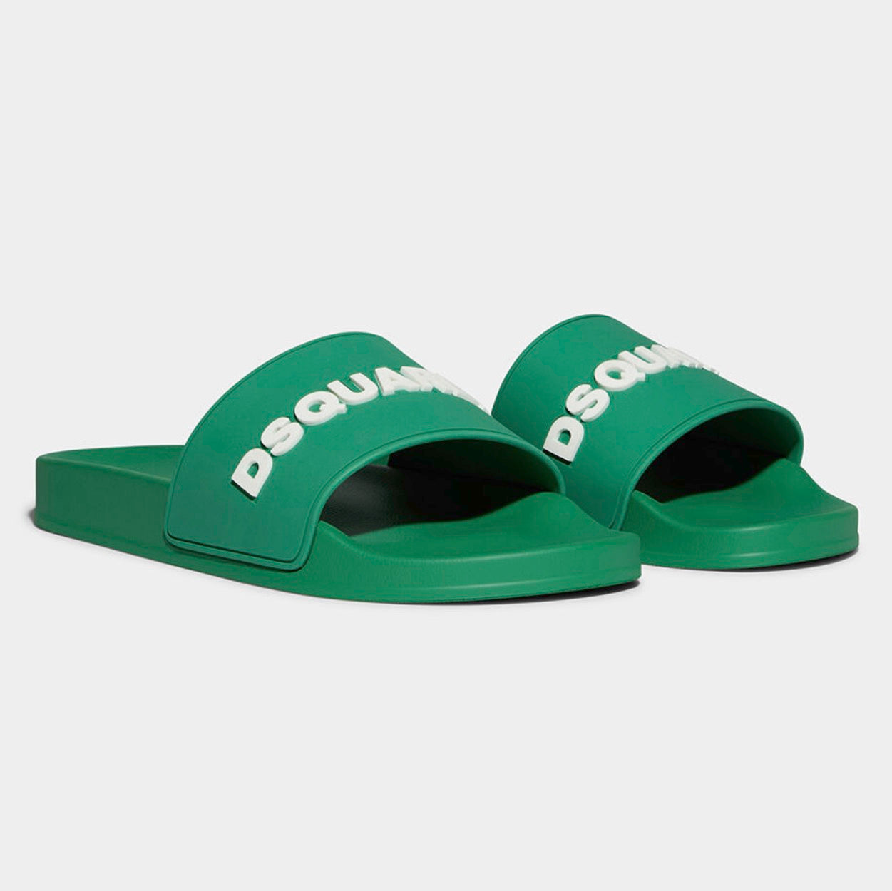 Treat yourself to a new eye-catching pair of footwear with the Dsquared2 Logo Slides. These block-colour slides feature a raised “DSQUARED2” logo on the front, elevating them from a simple wardrobe staple. These practical yet fun shoes are easy to slip on and look great paired with distressed jeans and chunky socks for a laidback look. 