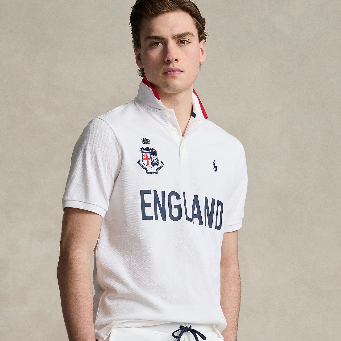 This version is crafted with our highly breathable cotton mesh and features a signature shield patch inspired by the flag of England.