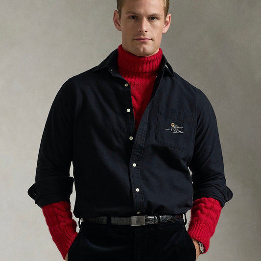 The oxford shirt made its debut very early on in Ralph Lauren’s designs, and since then it has solidified its status as a pillar of the Polo look. Today, Mr. Lauren continues to create countless variations of his iconic shirt, including this brushed version that is embroidered with our beloved mascot, the Polo Bear.