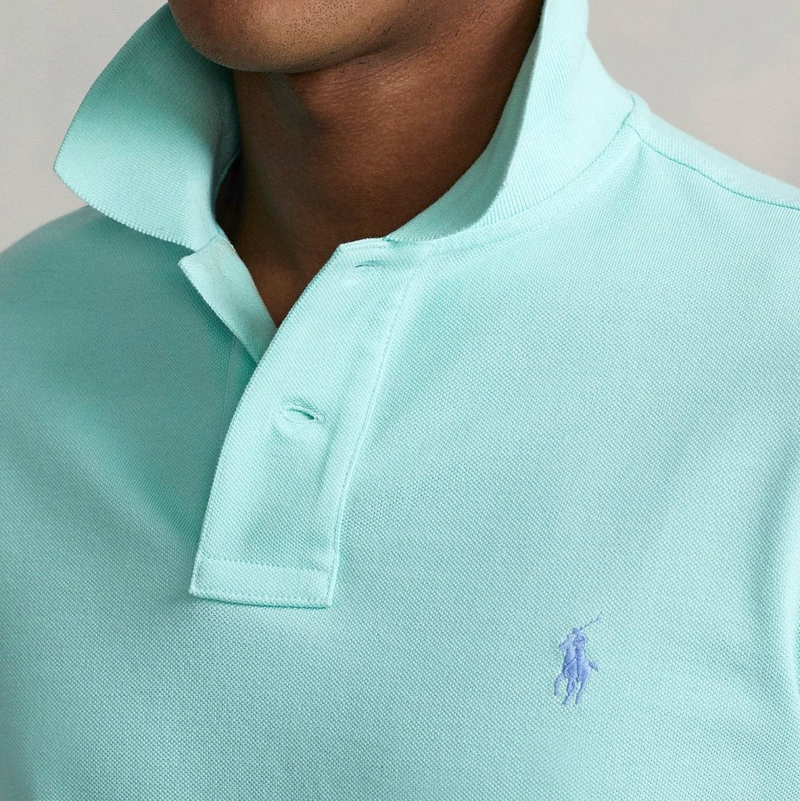 An American style standard since 1972, the Polo shirt has been imitated but never matched. Over the decades, Ralph Lauren has reimagined his signature style in a wide array of colors and fits, yet all retain the quality and attention to detail of the iconic original. This version is made from our highly breathable cotton mesh, which offers a textured look and a soft feel.