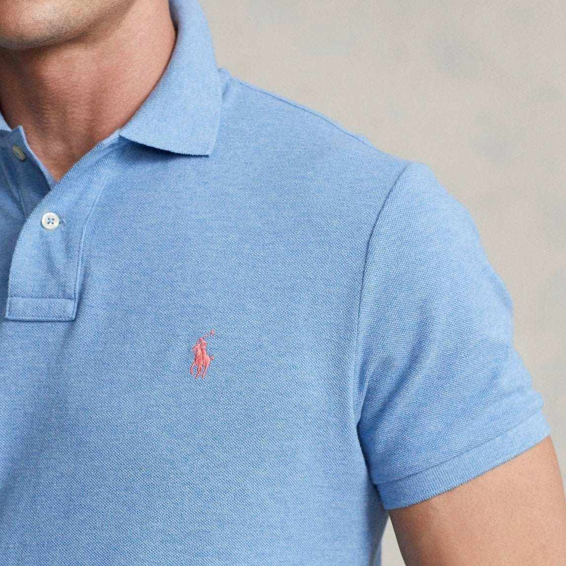 An American style standard since 1972, the Polo shirt has been imitated but never matched. Over the decades, Ralph Lauren has reimagined his signature style in a wide array of colors and fits, yet all retain the quality and attention to detail of the iconic original. This version is made from our highly breathable cotton mesh, which offers a textured look and a soft feel.