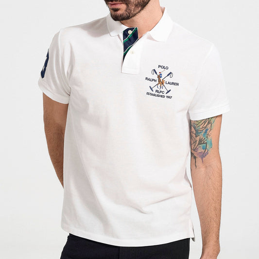 An American style standard since 1972, the Polo shirt has been imitated but never matched. Over the decades, Ralph Lauren has reimagined his signature style in a wide array of colors and fits, yet all retain the quality and attention to detail of the iconic original. This trim version features our multicolored signature Pony and a “3” patch, signifying the number typically worn by a polo team’s strongest player.