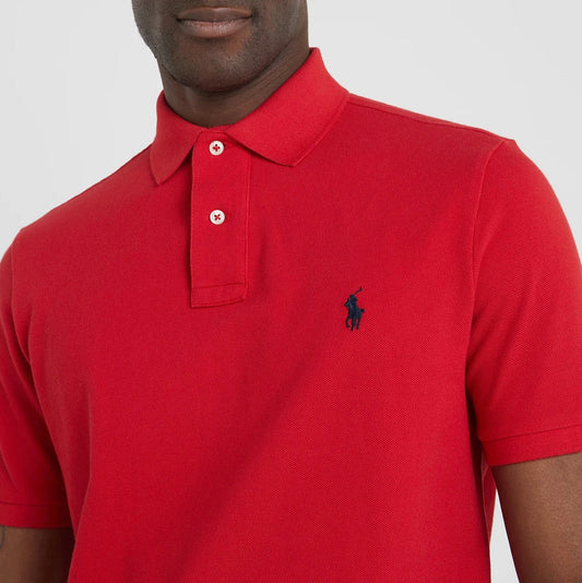 An American style standard since 1972, the Polo shirt has been imitated but never matched. Over the decades, Ralph Lauren has reimagined his signature style in a wide array of colors and fits, yet all retain the quality and attention to detail of the iconic original. This trim version is made from our highly breathable cotton mesh, which offers a textured look and a soft feel.