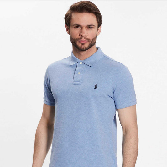 An American style standard since 1972, the Polo shirt has been imitated but never matched. Over the decades, Ralph Lauren has reimagined his signature style in a wide array of colors and fits, yet all retain the quality and attention to detail of the iconic original. This trim version is made from our highly breathable cotton mesh, which offers a textured look and a soft feel.