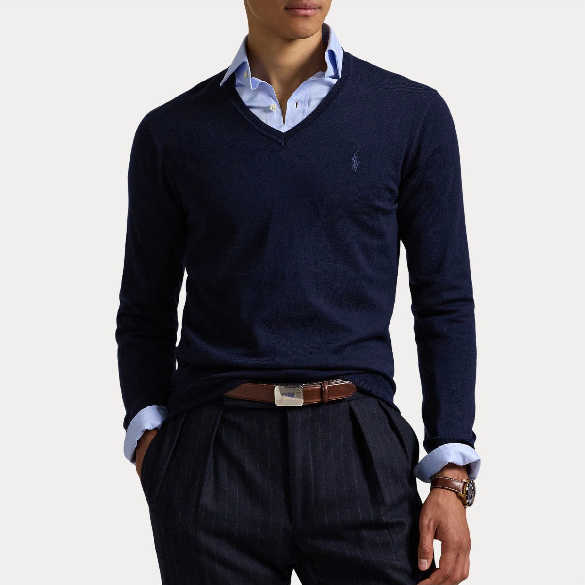 Finished with our signature embroidered Pony, this lightweight sweater is finely knit with wool yarn from Italy that is machine washable and worsted for a smooth texture.